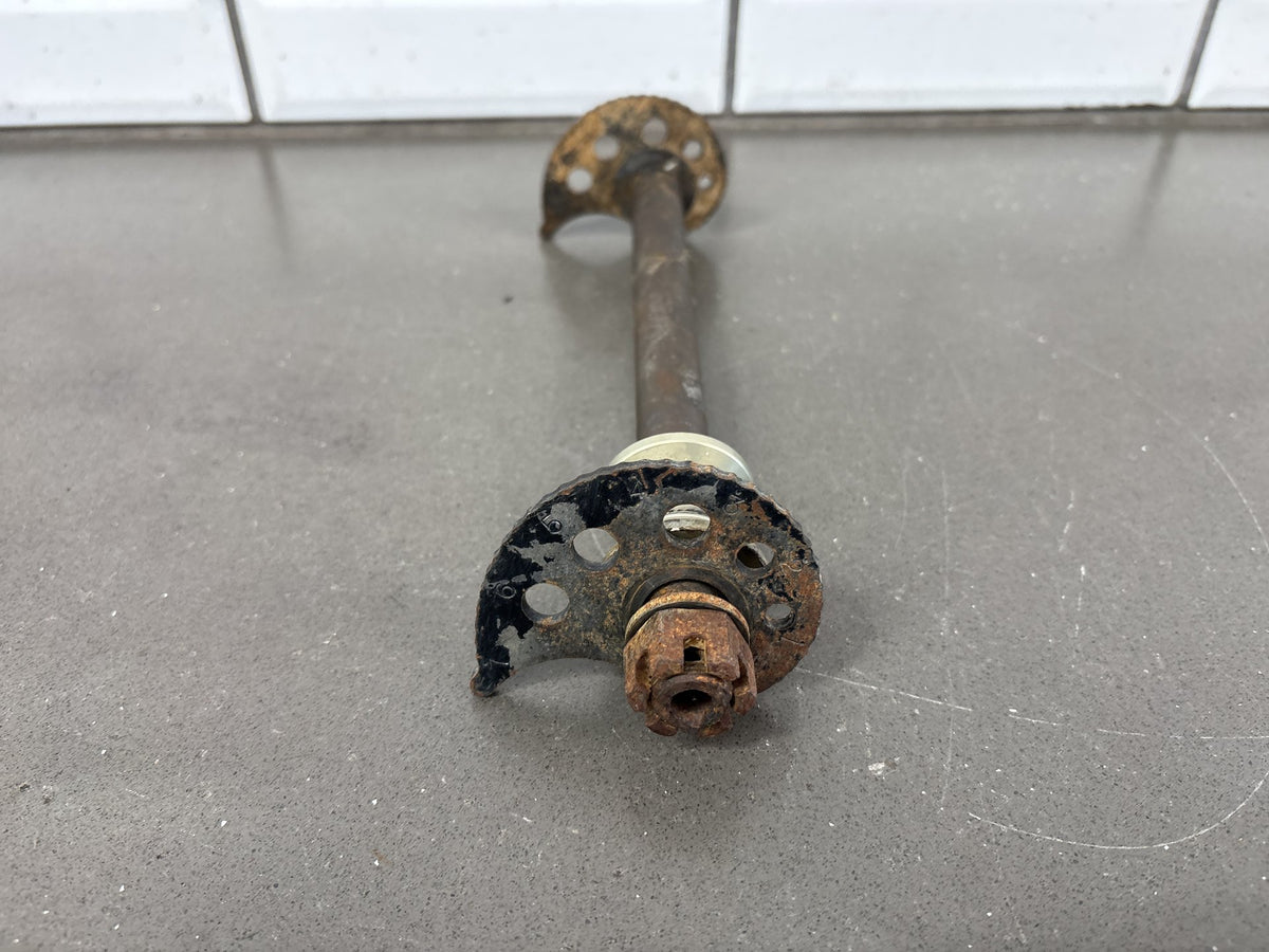 1991-1992 Kawasaki KX250, KX125 Rear Axle with Chain Adjuster Blocks OEM