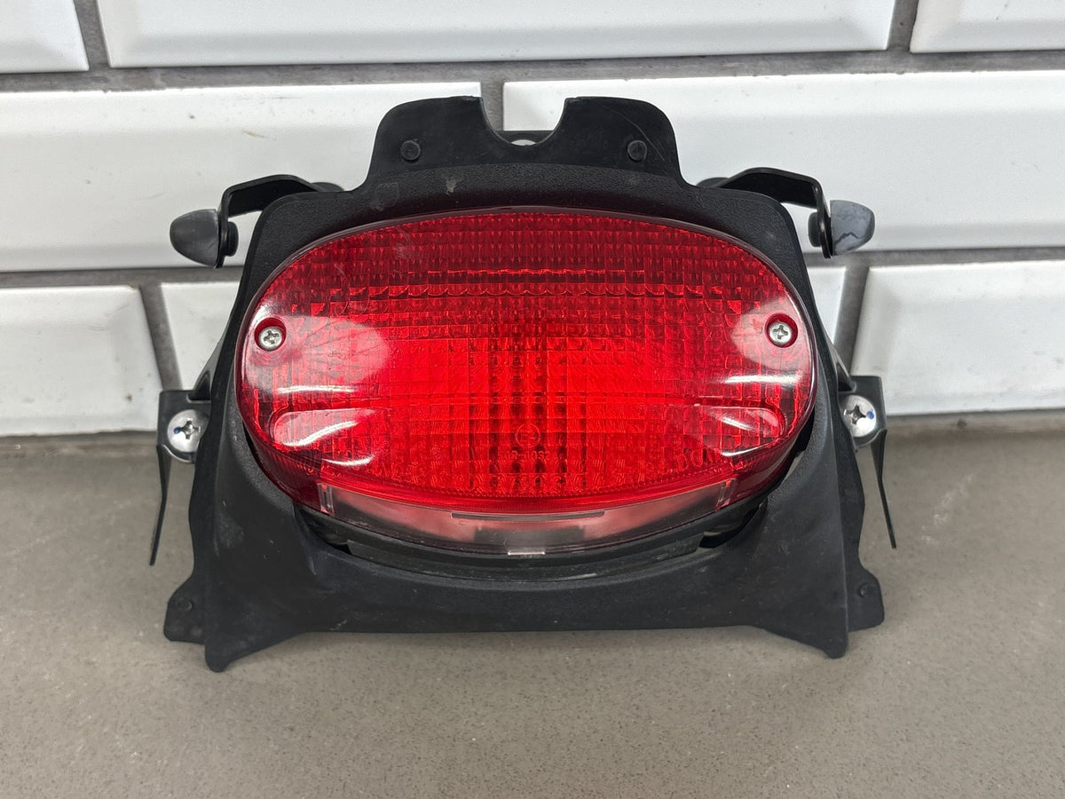 1999-2007 Yamaha YZF600R Tail Light Brake Light w/ Bracket Trim Red Lens OEM