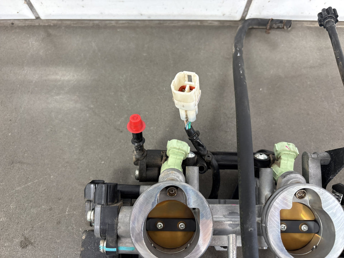 20-22 Kawasaki Ninja 650 EX650 Throttle Body Injectors (California) 16163-1132