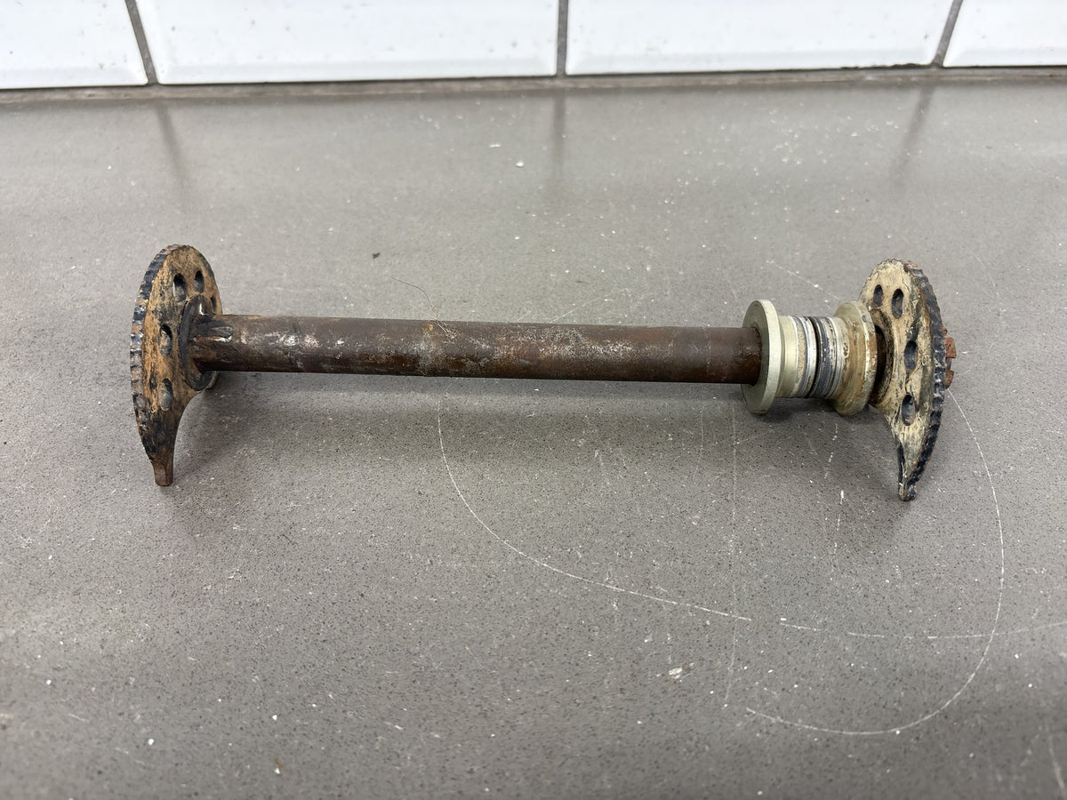 1991-1992 Kawasaki KX250, KX125 Rear Axle with Chain Adjuster Blocks OEM