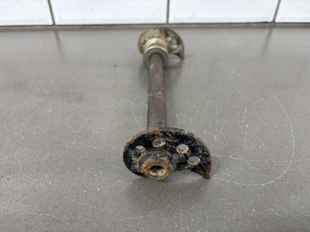 1991-1992 Kawasaki KX250, KX125 Rear Axle with Chain Adjuster Blocks OEM