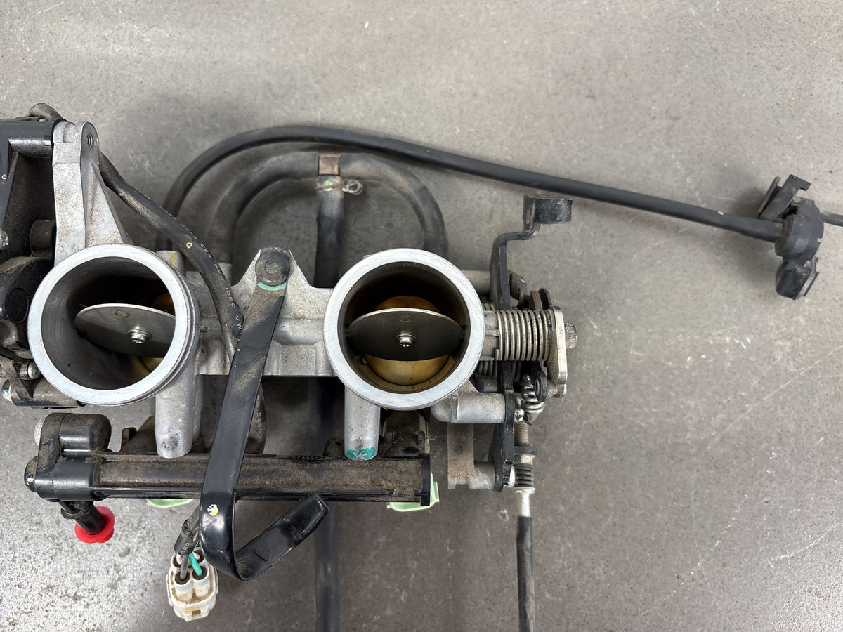 20-22 Kawasaki Ninja 650 EX650 Throttle Body Injectors (California) 16163-1132