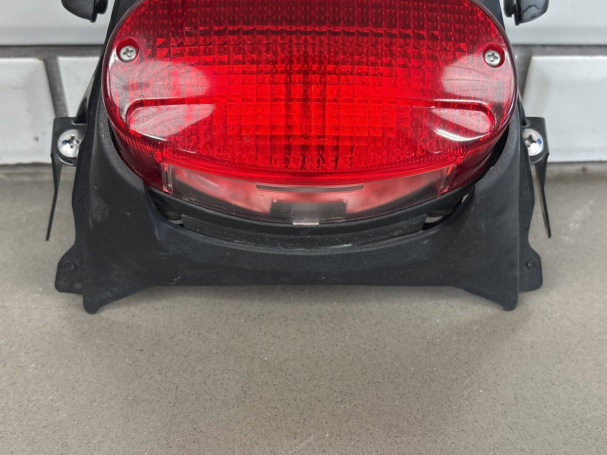 1999-2007 Yamaha YZF600R Tail Light Brake Light w/ Bracket Trim Red Lens OEM