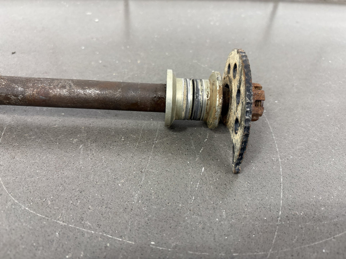 1991-1992 Kawasaki KX250, KX125 Rear Axle with Chain Adjuster Blocks OEM